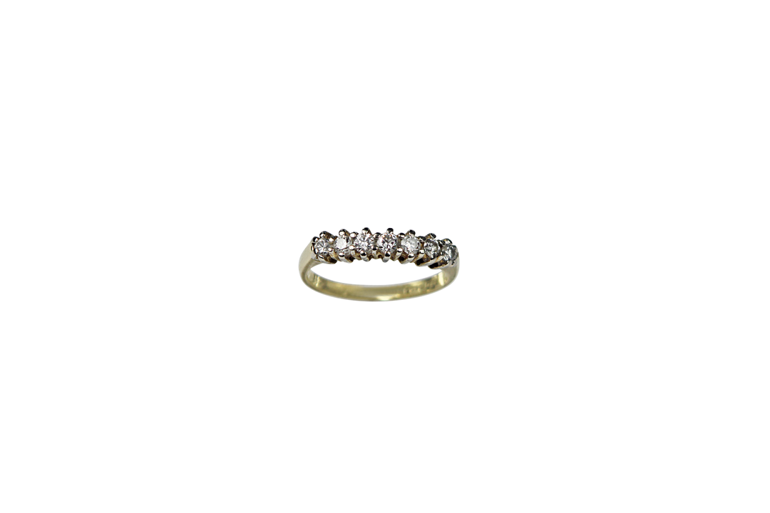 18kt Yellow Gold Eternity Ring with 7 Round Cut Diamonds