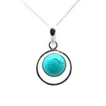 Load image into Gallery viewer, Round Sterling Silver Pendent with a Cbuchone Turquoise
